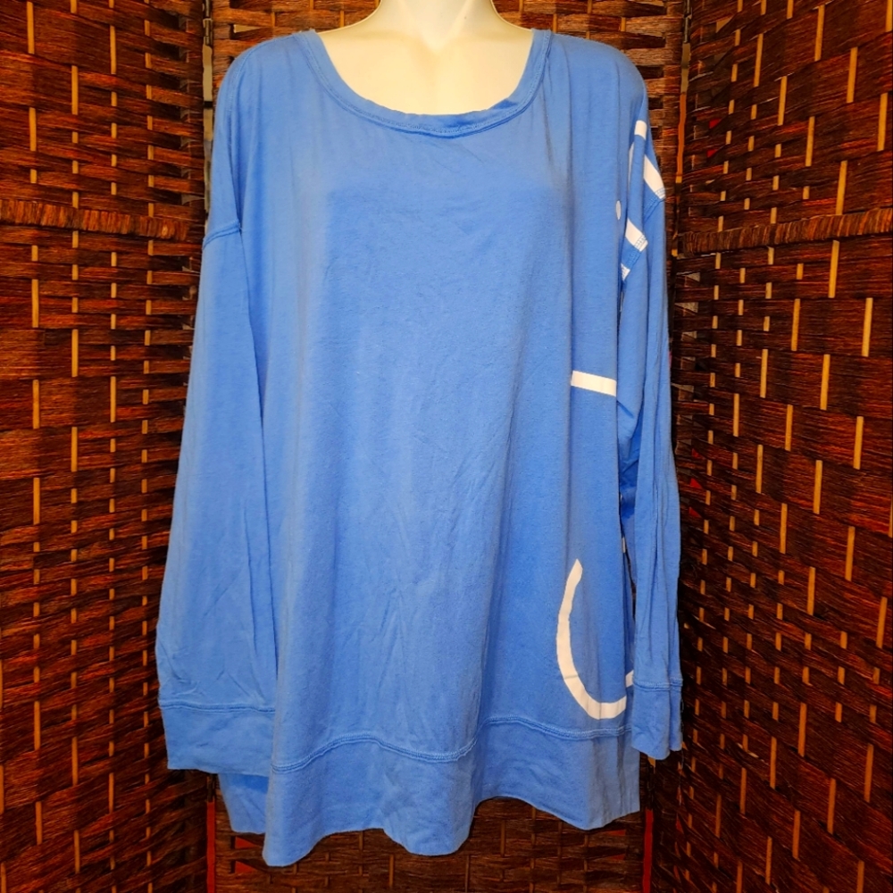 Calvin Klein Shirt Long sleeves is a blue top with Calvin Klein letters on the s